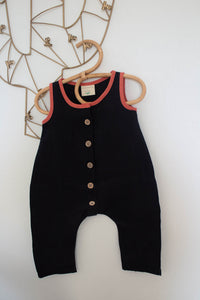 Hemp Children's Playsuit Black with Orange Rust trim.   Coconut buttons down the front